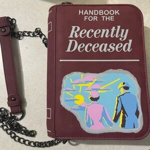 Beetlejuice purse with inside zipper.